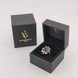 Vintage Silberring mit violettem Glasstein & filigraner Ornamentfassung aus den 1950er Jahren
