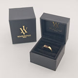 Goldring mit zentralem Rubin