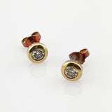 Klassiche Ohrstecker aus Gold mit Diamanten