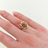 Verspielter Blütenring aus Gold mit Amethyst