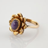 Verspielter Blütenring aus Gold mit Amethyst