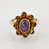 Verspielter Blütenring aus Gold mit Amethyst