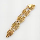 Goldarmband mit floralen Gliedern, um 1950