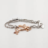 JOOP! Silber Set mit Schleifenmotiv – Halskette & Armband, teilvergoldet