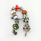 PANDORA Silberarmband mit Charms und Glasbeads