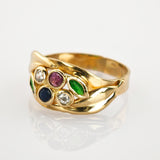 Goldring mit Spinellen und grünen Glassteinen