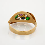 Goldring mit Spinellen und grünen Glassteinen