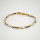 Goldarmband mit blauem Spinell und Quarz im Art-Déco-Stil