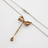 Kette Gold Platin Schleifenmotiv mit Diamanten im Stil Art-déco