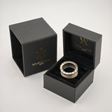 Zwei schwarze Schmuckboxen mit goldener Aufschrift "yourvintoge.shop" und stilisiertem W-Logo. Eine Box zeigt einen silbernen BVLGARI-Ring auf schwarzem Samtkissen.